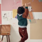 La face arrière du pull Usman de la marque Louise Misha porté par un enfant