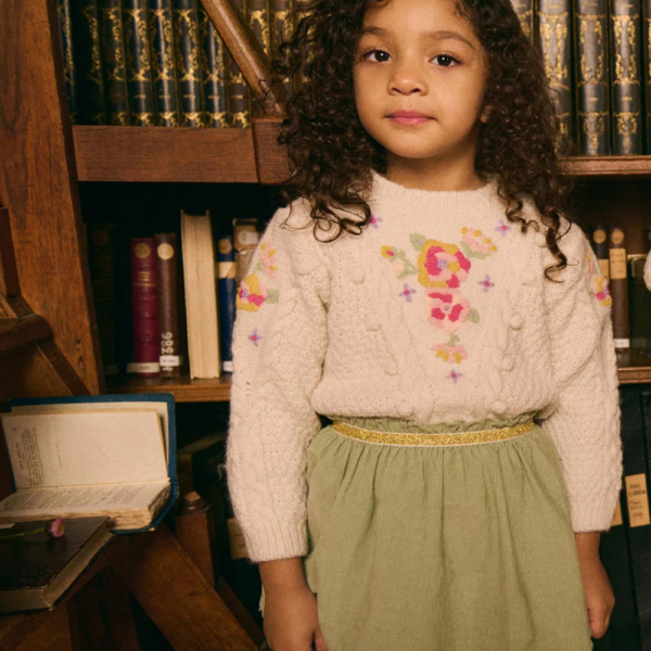 La jupe Cephee de la marque Louise Misha portée par un enfant