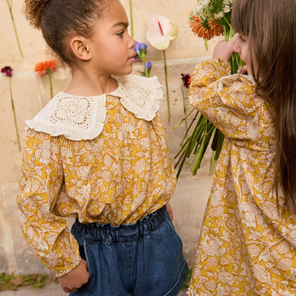 Short Virginia de Louise Misha Le short Virginia de la marque Louise Misha porté par un enfant